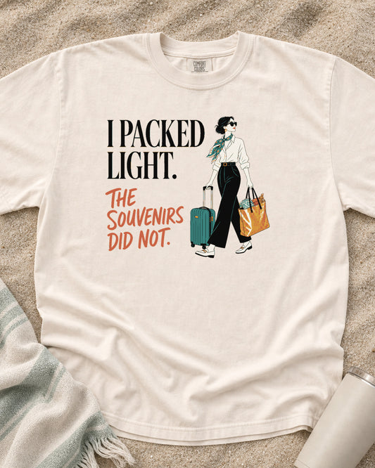 Ivory Comfort Colors 1717 tee with I Packed Light. The Souvenirs Did Not graphic.