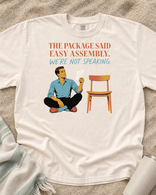 Ivory Comfort Colors 1717 tee with The Package Said Easy Assembly. We're Not Speaking graphic.