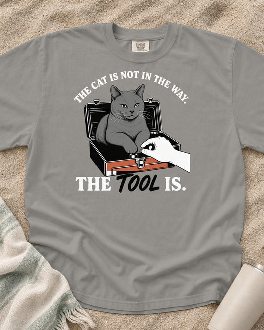 Grey Comfort Colors 1717 tee with The Cat Is Not in the Way. The Tool Is graphic.
