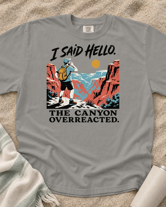 Grey Comfort Colors 1717 tee with I Said Hello. The Canyon Overreacted graphic.
