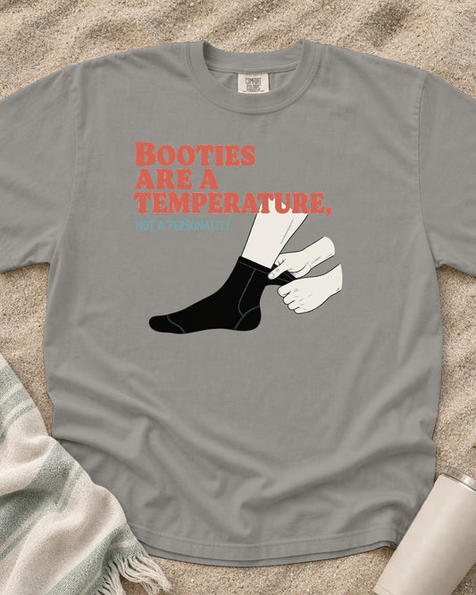 Grey Comfort Colors 1717 tee with Booties Are a Temperature, Not a Personality graphic.