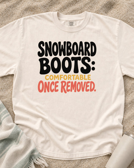 Ivory Comfort Colors 1717 tee with Snowboard Boots: Comfortable Once Removed graphic.