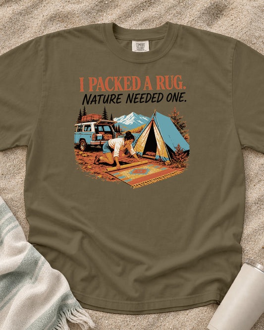 Khaki Comfort Colors 1717 tee with Nature Needed a Rug graphic.