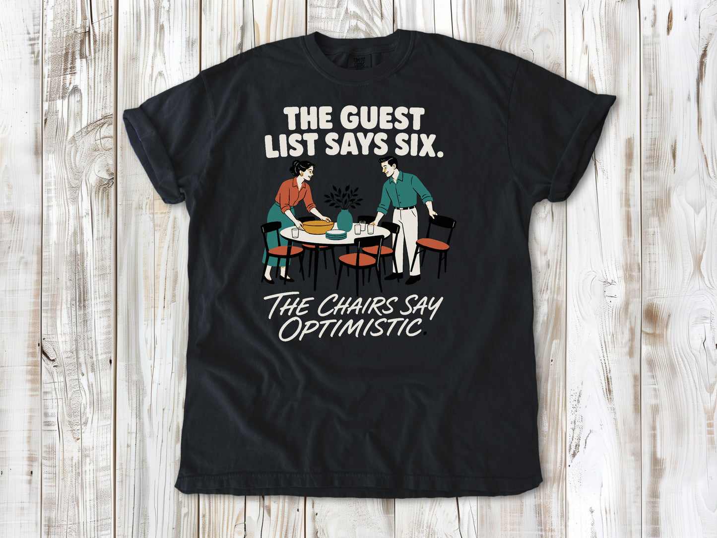 The Guest List Says Six. The Chairs Say Optimistic. Tee