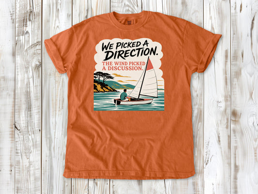 Seafoam garment-dyed tee with We Picked a Direction The Wind Picked a Discussion sailing graphic.