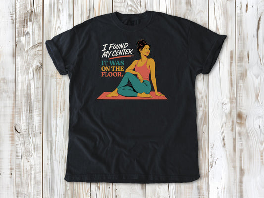 Washed Denim garment-dyed tee with I Found My Center It Was on the Floor yoga graphic.
