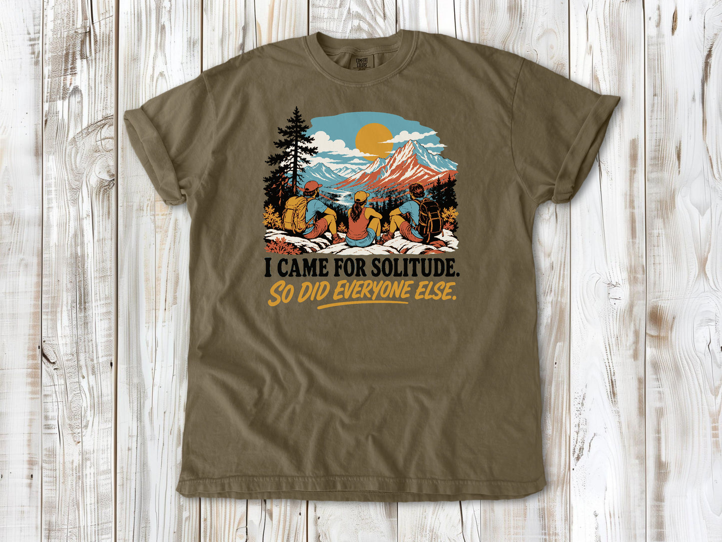 Graphite garment-dyed tee with I Came for Solitude So Did Everyone Else hiking graphic.