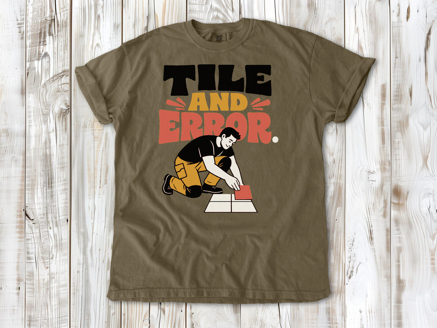 Graphite garment-dyed tee with Tile and Error tile setter graphic.