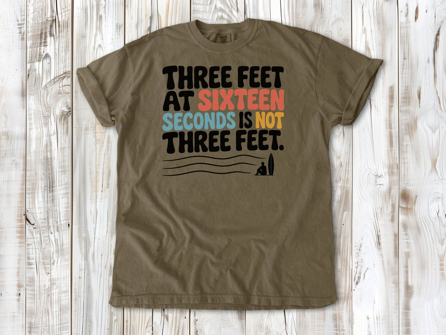 Graphite garment-dyed tee with Three Feet at Sixteen Seconds Is Not Three Feet surf forecast graphic.
