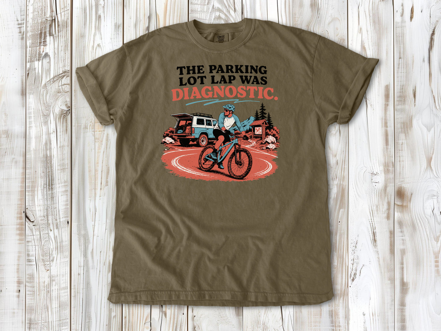 Graphite garment-dyed tee with The Parking Lot Lap Was Diagnostic mountain biking graphic.