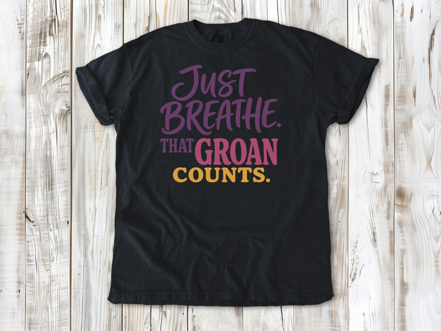 Washed Denim garment-dyed tee with Just Breathe That Groan Counts yoga graphic.