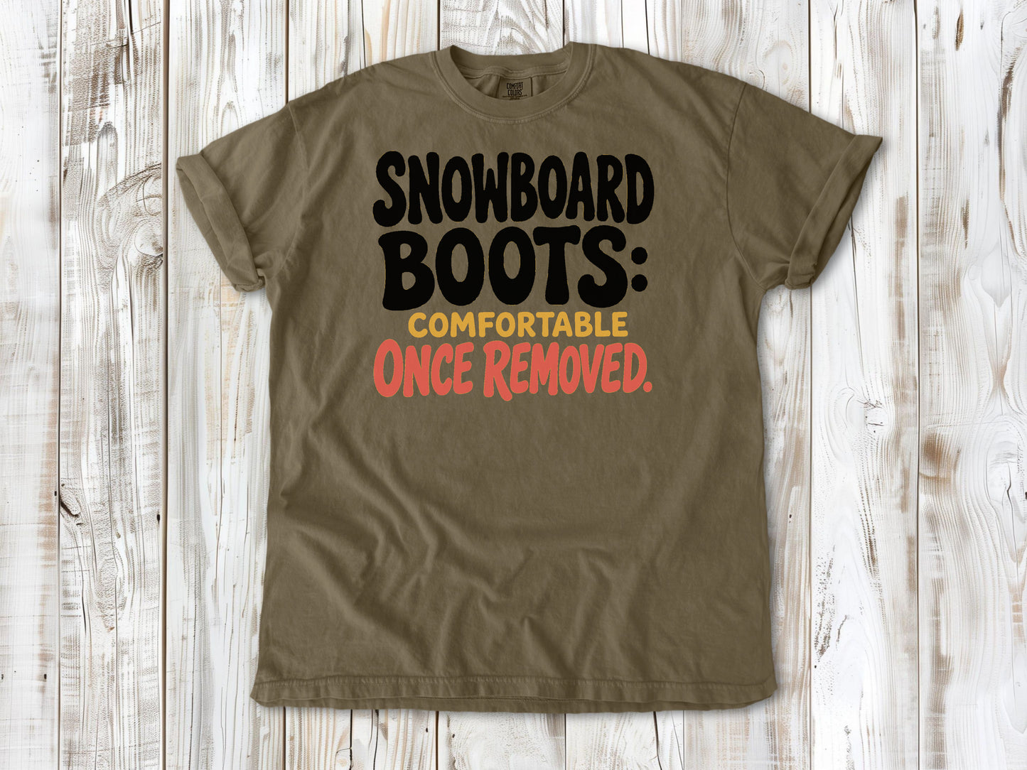Graphite garment-dyed tee with Snowboard Boots Comfortable Once Removed graphic.