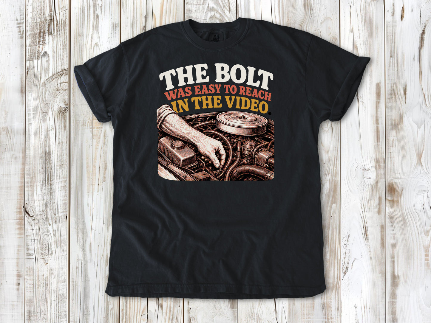 Graphite garment-dyed tee with The Bolt Was Easy to Reach in the Video mechanic graphic.