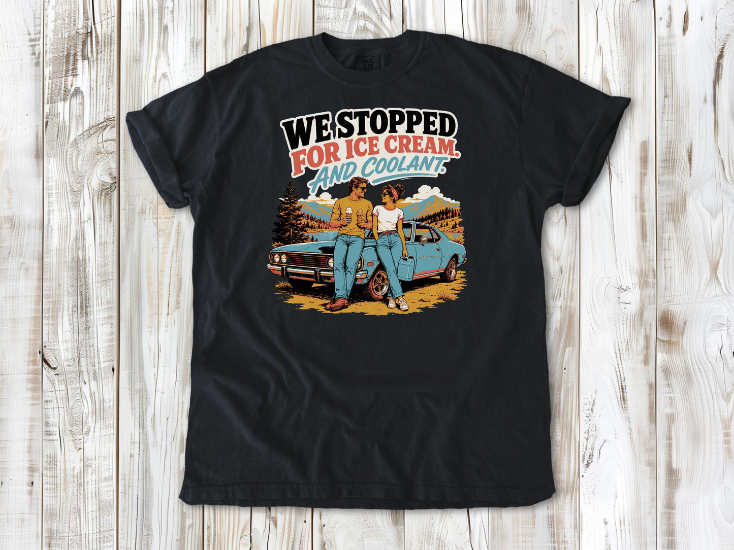 Graphite garment-dyed tee with We Stopped for Ice Cream and Coolant road trip graphic.