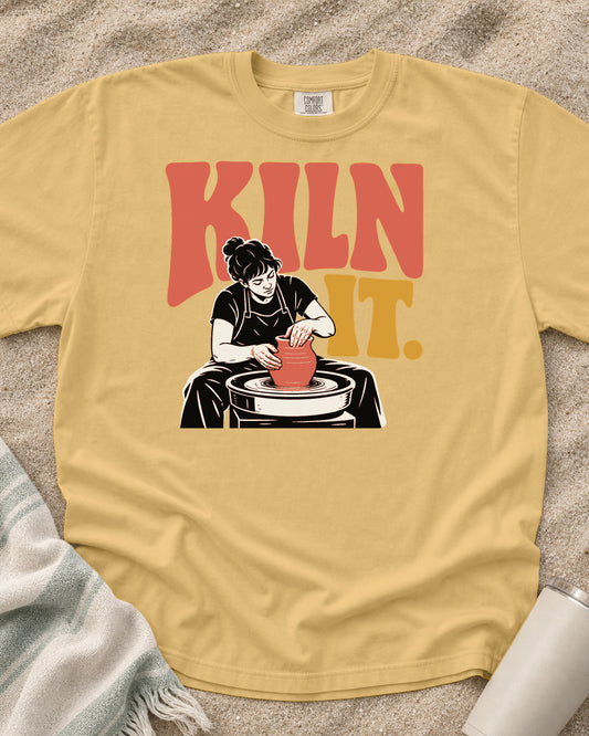 Mustard Comfort Colors 1717 tee with Kiln It graphic.