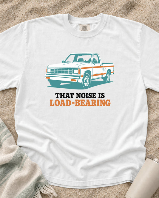 White Comfort Colors 1717 tee with That Noise Is Load-Bearing graphic.