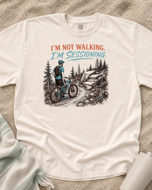 Ivory Comfort Colors 1717 tee with I'm Not Walking. I'm Sessioning graphic.