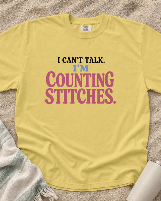 Butter Comfort Colors 1717 tee with I Can't Talk. I'm Counting Stitches graphic.