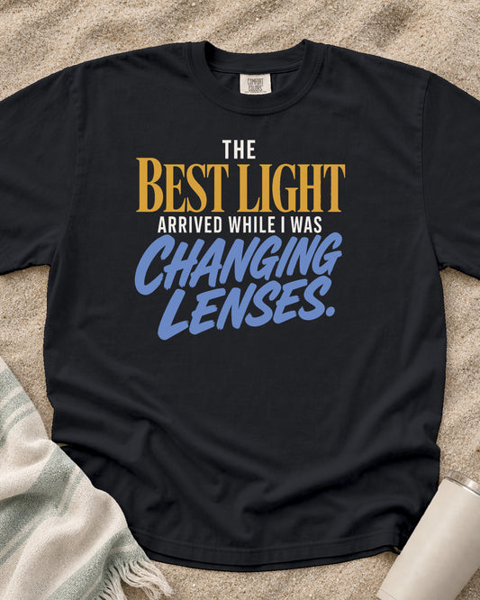 Graphite Comfort Colors 1717 tee with The Best Light Arrived While I Was Changing Lenses graphic.