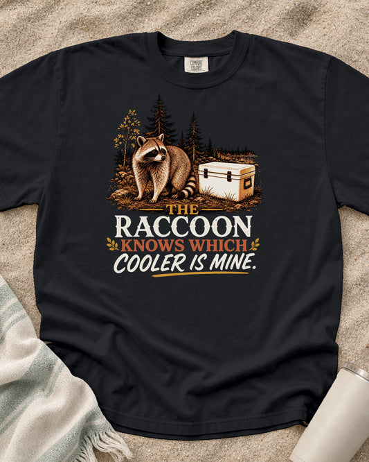 Graphite Comfort Colors 1717 tee with The Raccoon Knows My Cooler graphic.