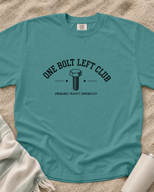 Seafoam Comfort Colors 1717 tee with One Bolt Left Club graphic.