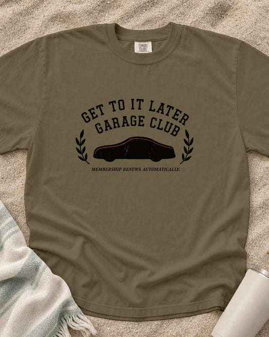 Khaki Comfort Colors 1717 tee with Get to It Later Garage Club graphic.