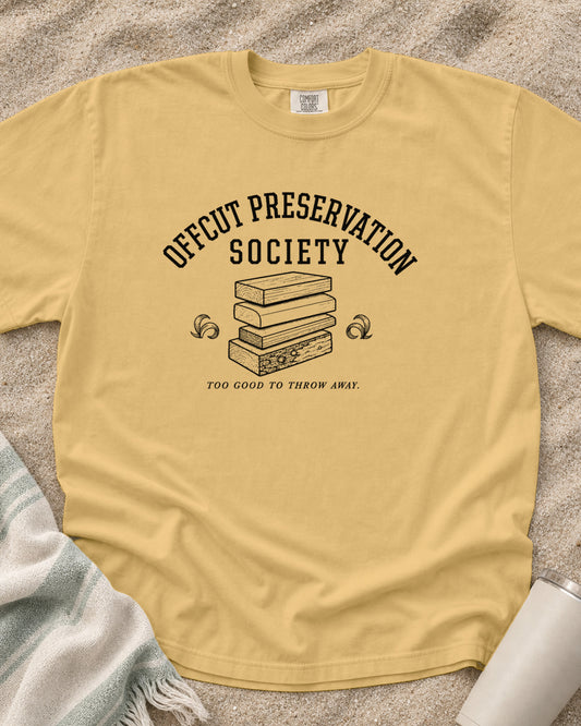 Mustard Comfort Colors 1717 tee with Offcut Preservation Society graphic.