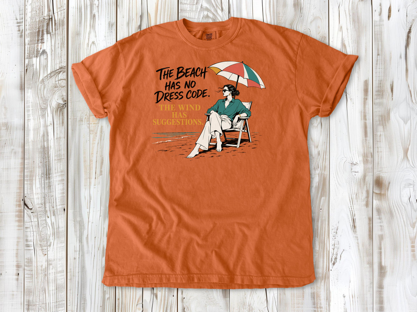 The Beach Has No Dress Code. The Wind Has Suggestions. Tee
