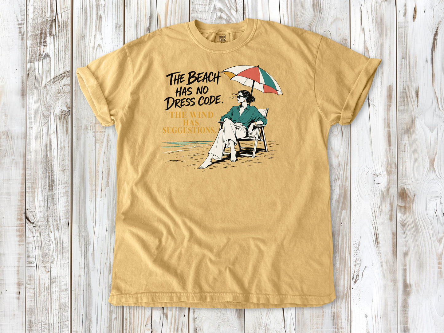 The Beach Has No Dress Code. The Wind Has Suggestions. Tee