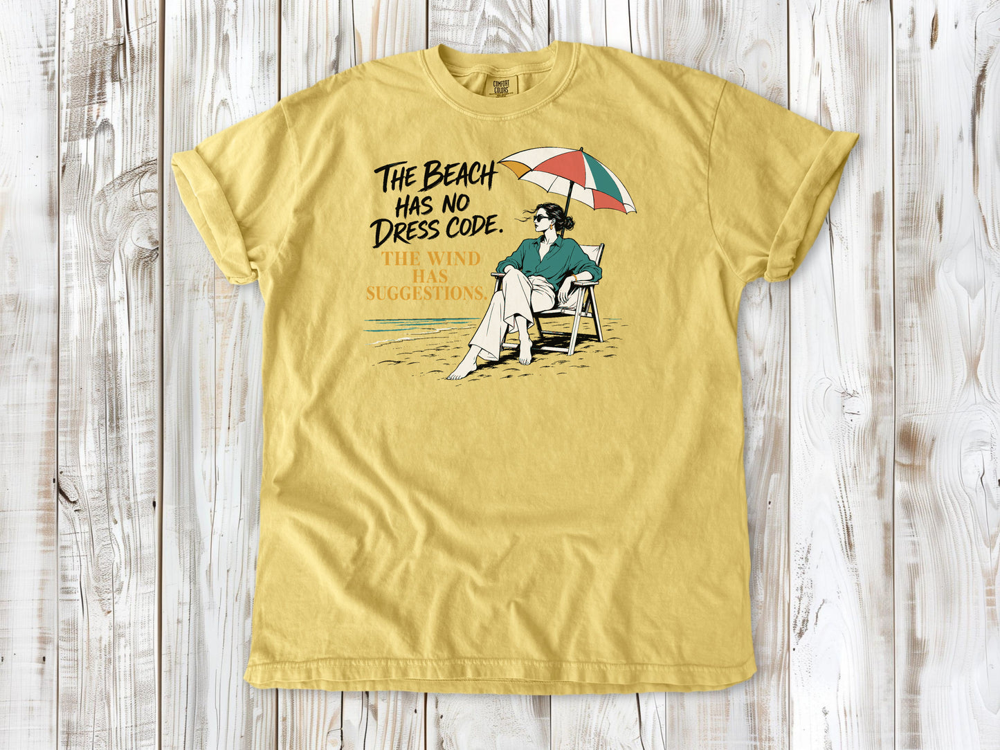 The Beach Has No Dress Code. The Wind Has Suggestions. Tee