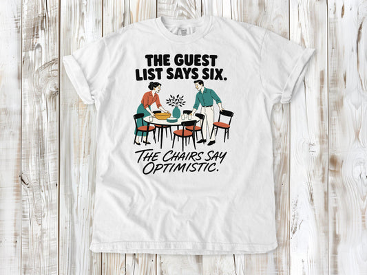 The Guest List Says Six. The Chairs Say Optimistic. Tee