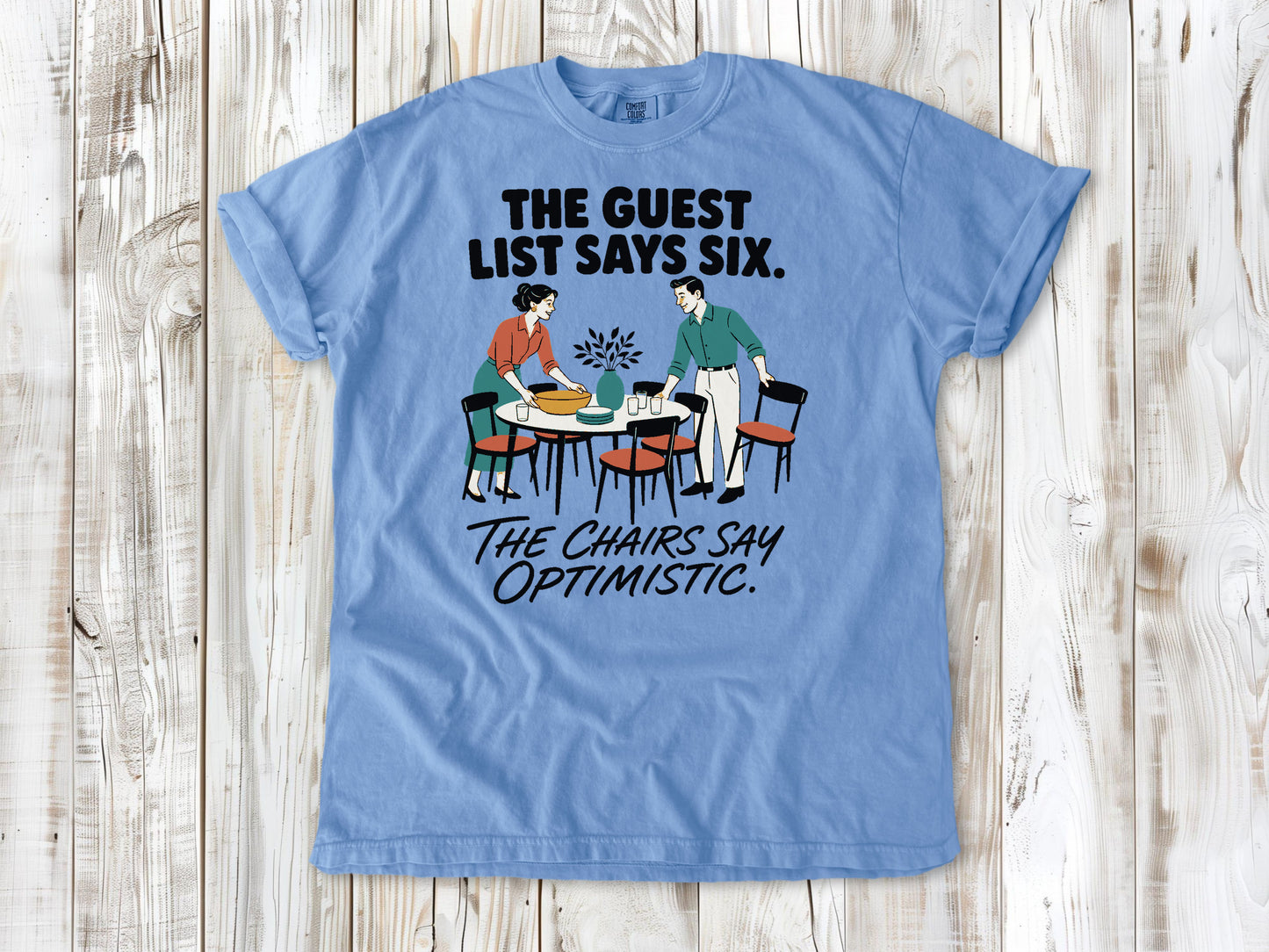 The Guest List Says Six. The Chairs Say Optimistic. Tee