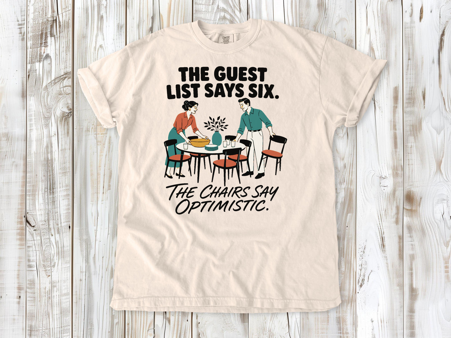 The Guest List Says Six. The Chairs Say Optimistic. Tee