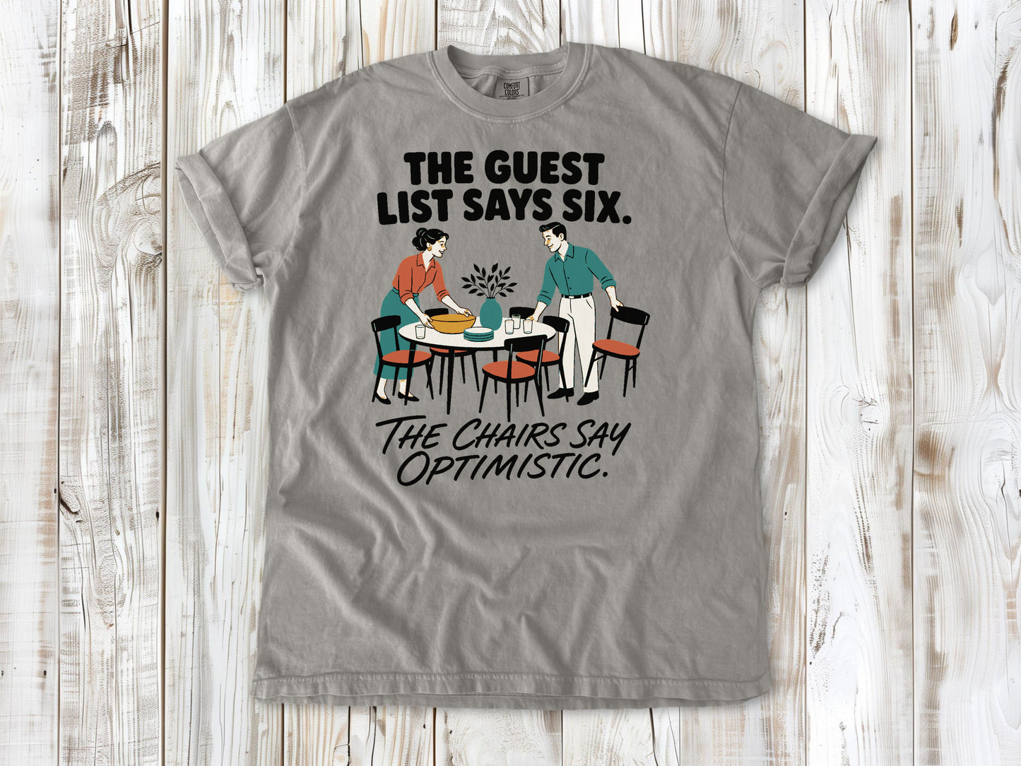 The Guest List Says Six. The Chairs Say Optimistic. Tee