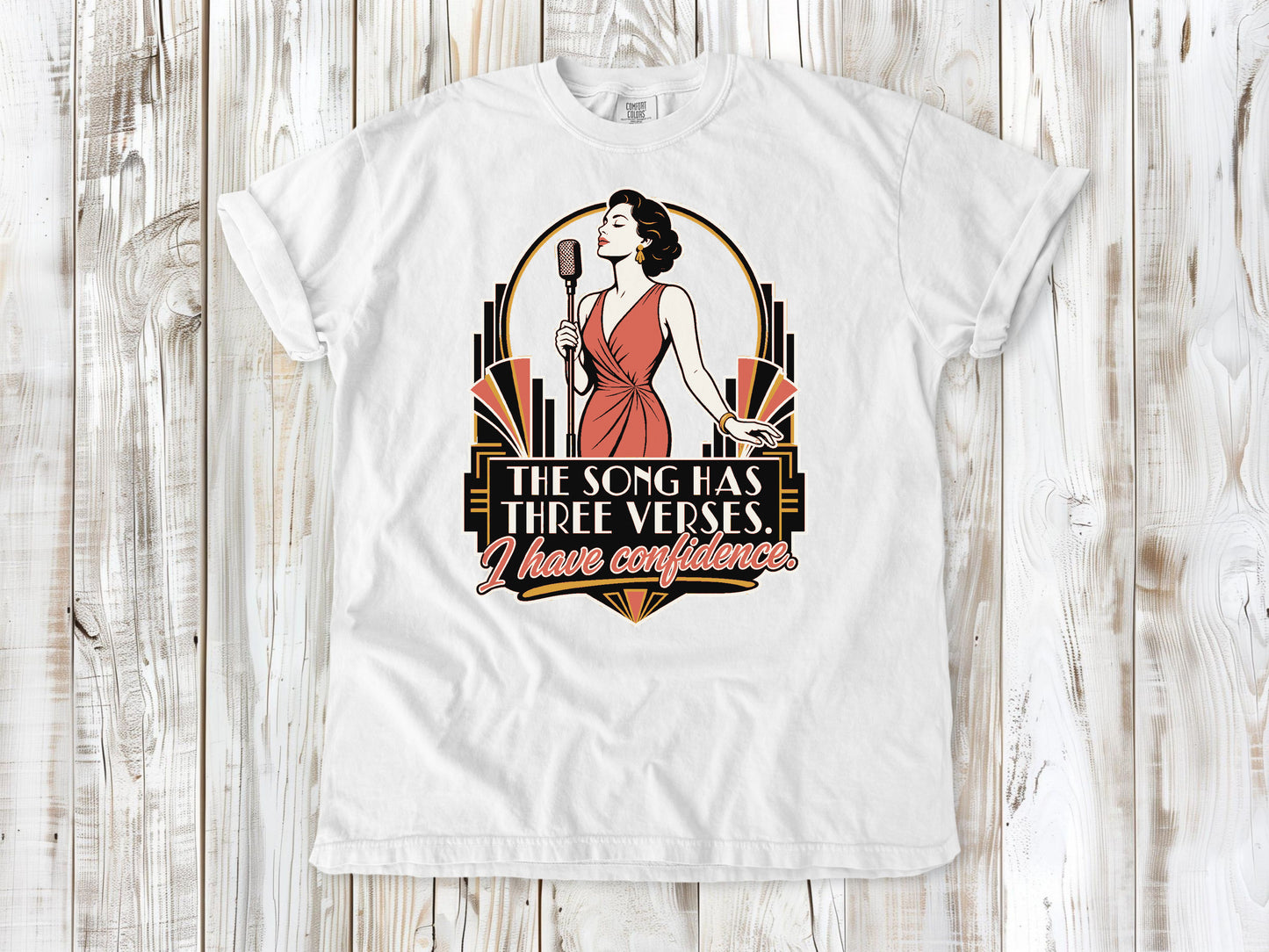 White garment-dyed tee with The Song Has Three Verses I Have Confidence singing graphic.