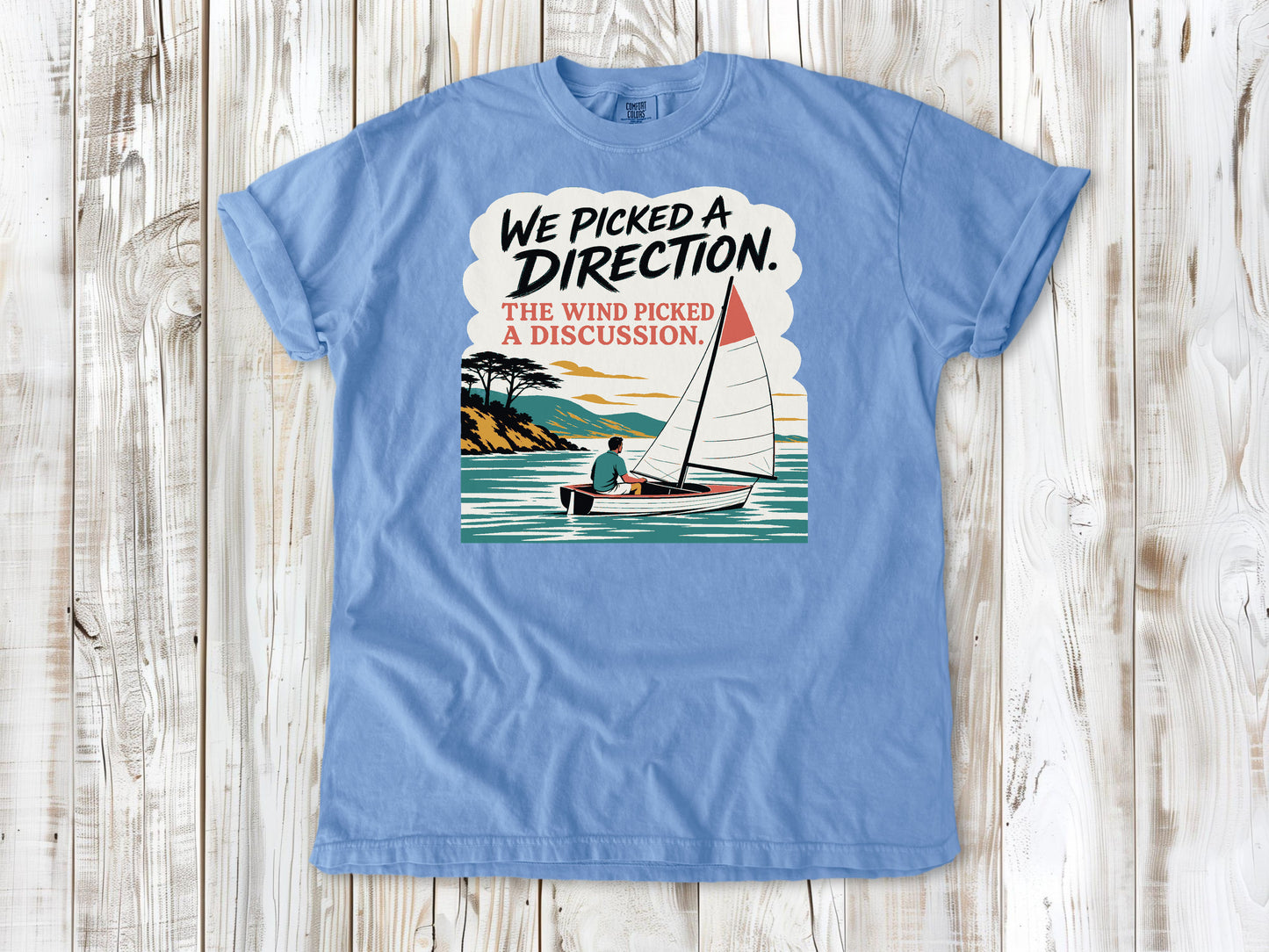 Pepper garment-dyed tee with We Picked a Direction The Wind Picked a Discussion sailing graphic.