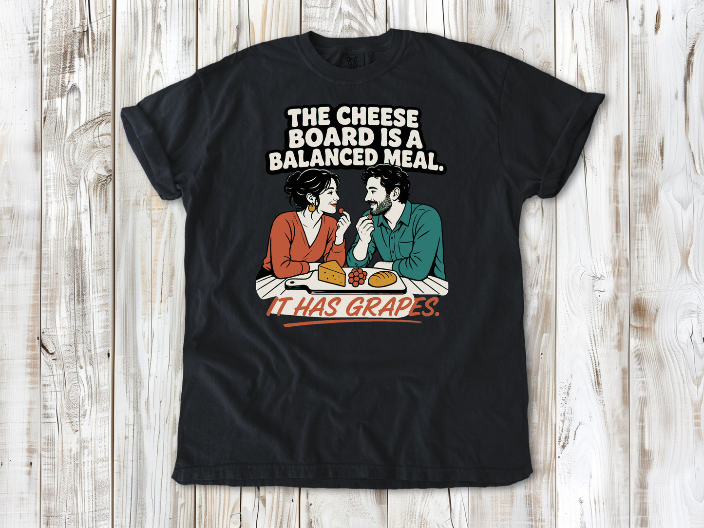 Washed Denim garment-dyed tee with The Cheese Board Is a Balanced Meal It Has Grapes graphic.