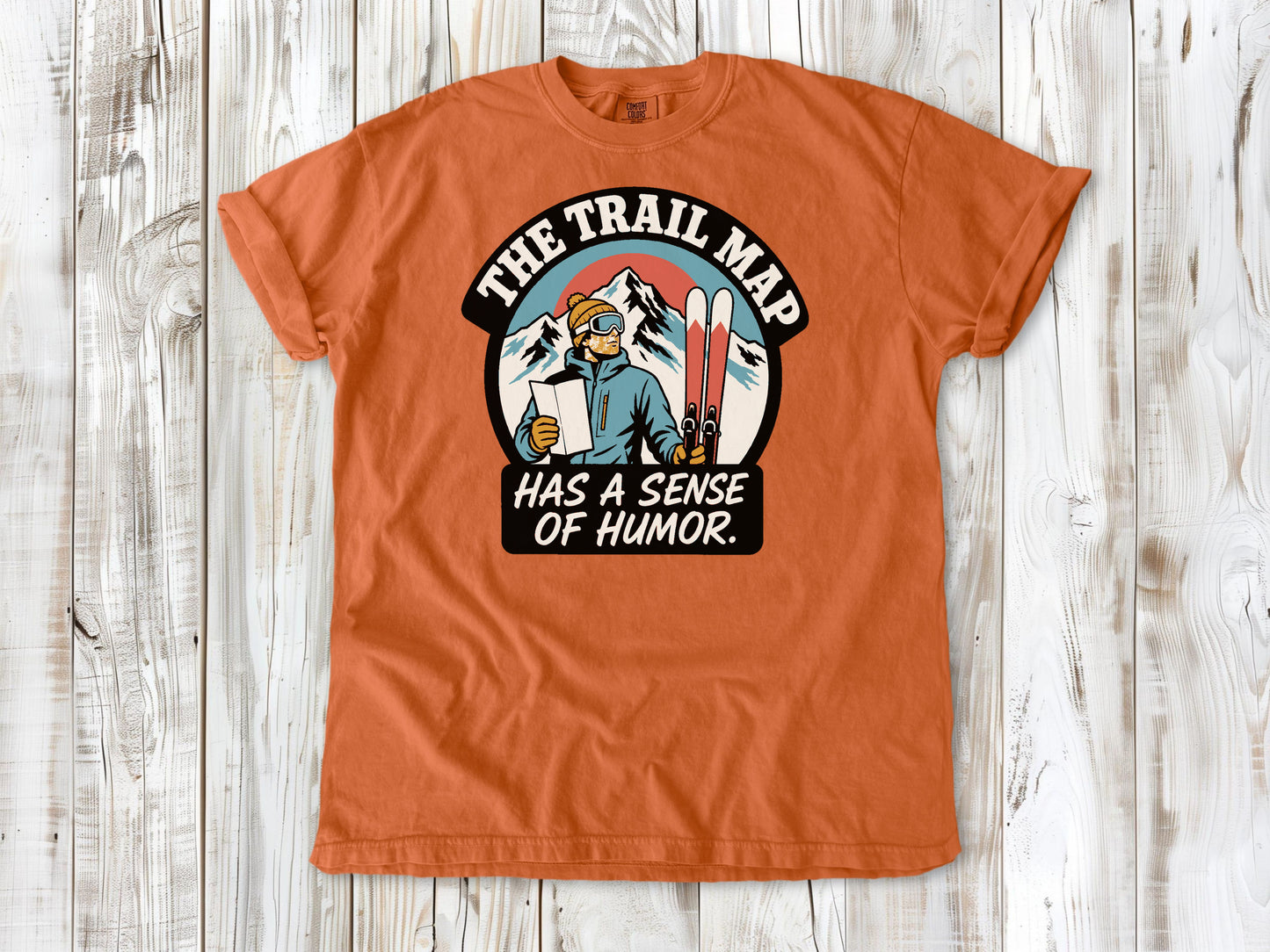 Seafoam garment-dyed tee with The Trail Map Has a Sense of Humor hiking graphic.