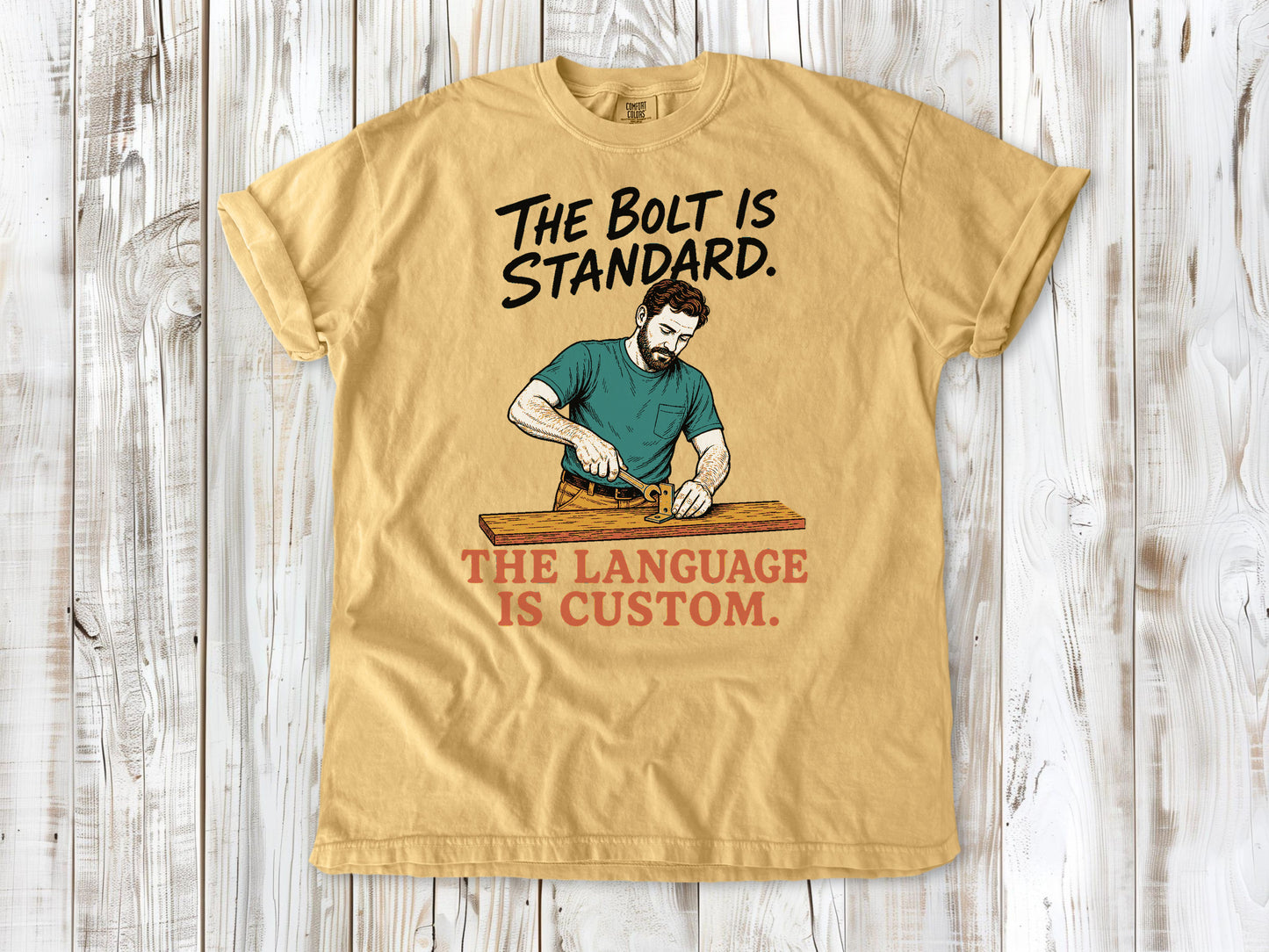 Burnt Orange garment-dyed tee with The Bolt Is Standard The Language Is Custom mechanic graphic.