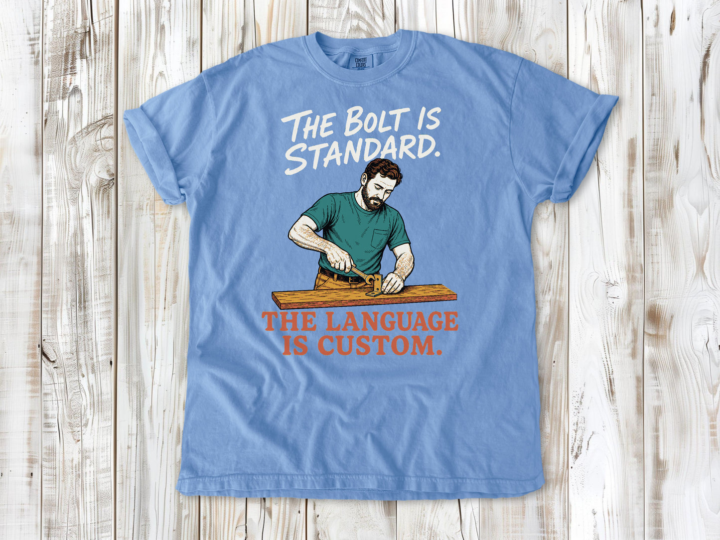 Pepper garment-dyed tee with The Bolt Is Standard The Language Is Custom mechanic graphic.
