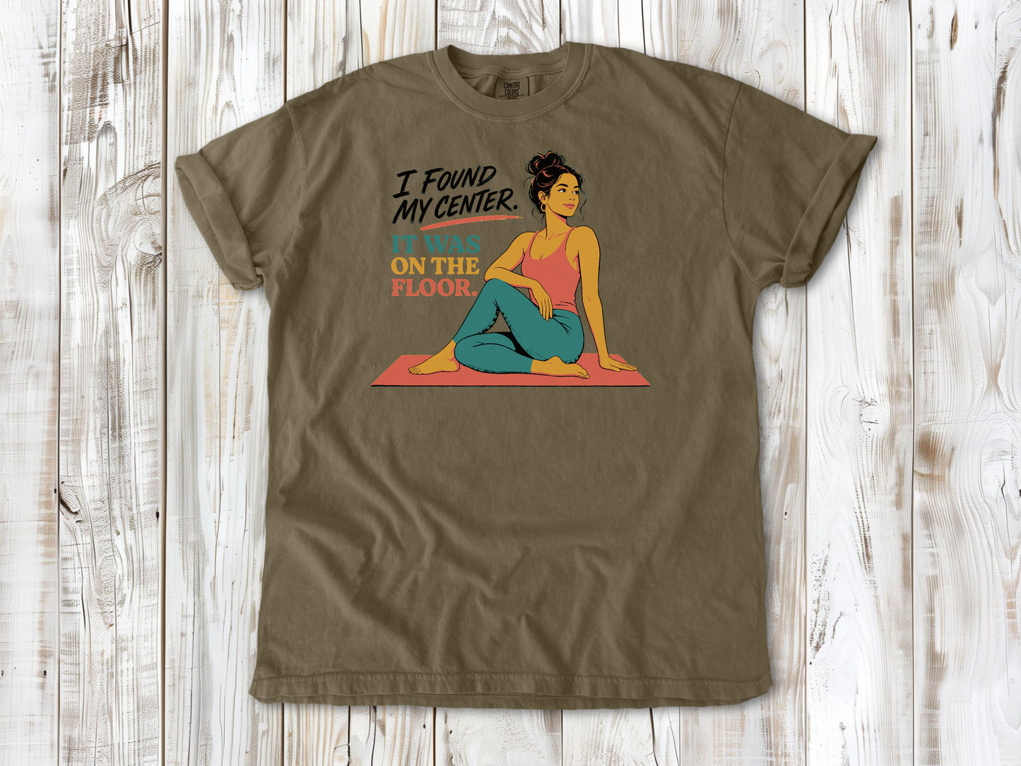 Graphite garment-dyed tee with I Found My Center It Was on the Floor yoga graphic.