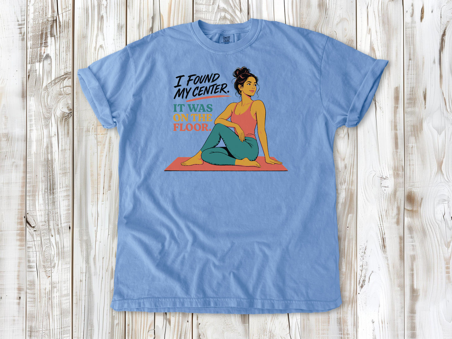 Pepper garment-dyed tee with I Found My Center It Was on the Floor yoga graphic.