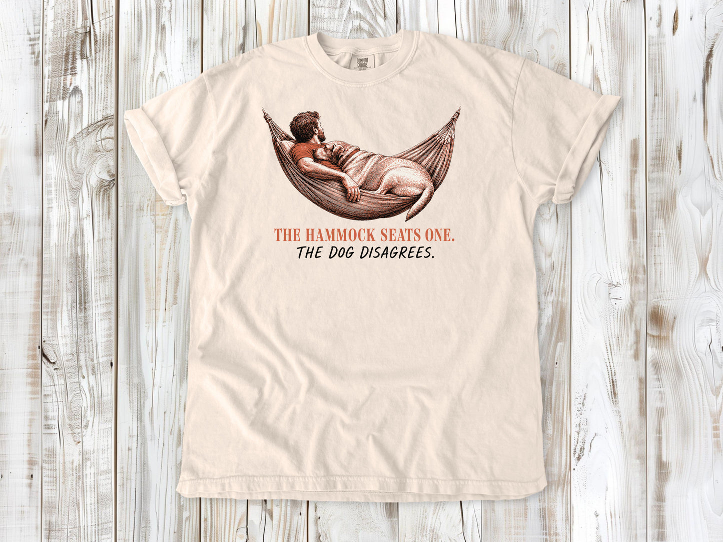 Butter garment-dyed tee with The Hammock Seats One The Dog Disagrees dog graphic.