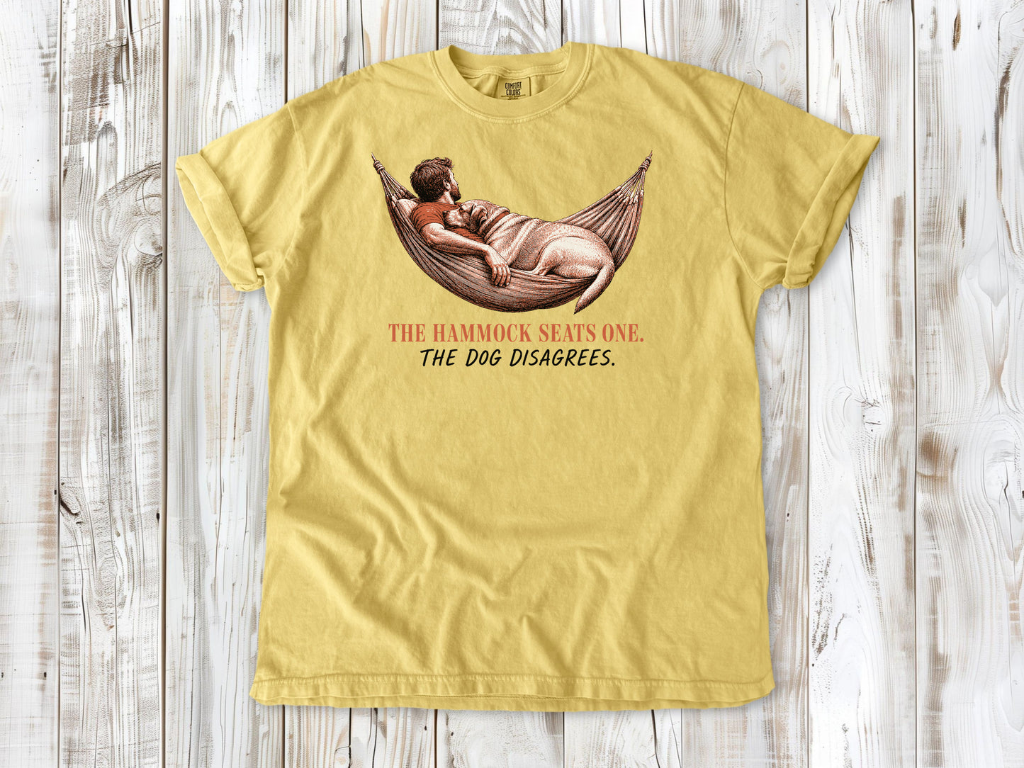 Grey garment-dyed tee with The Hammock Seats One The Dog Disagrees dog graphic.