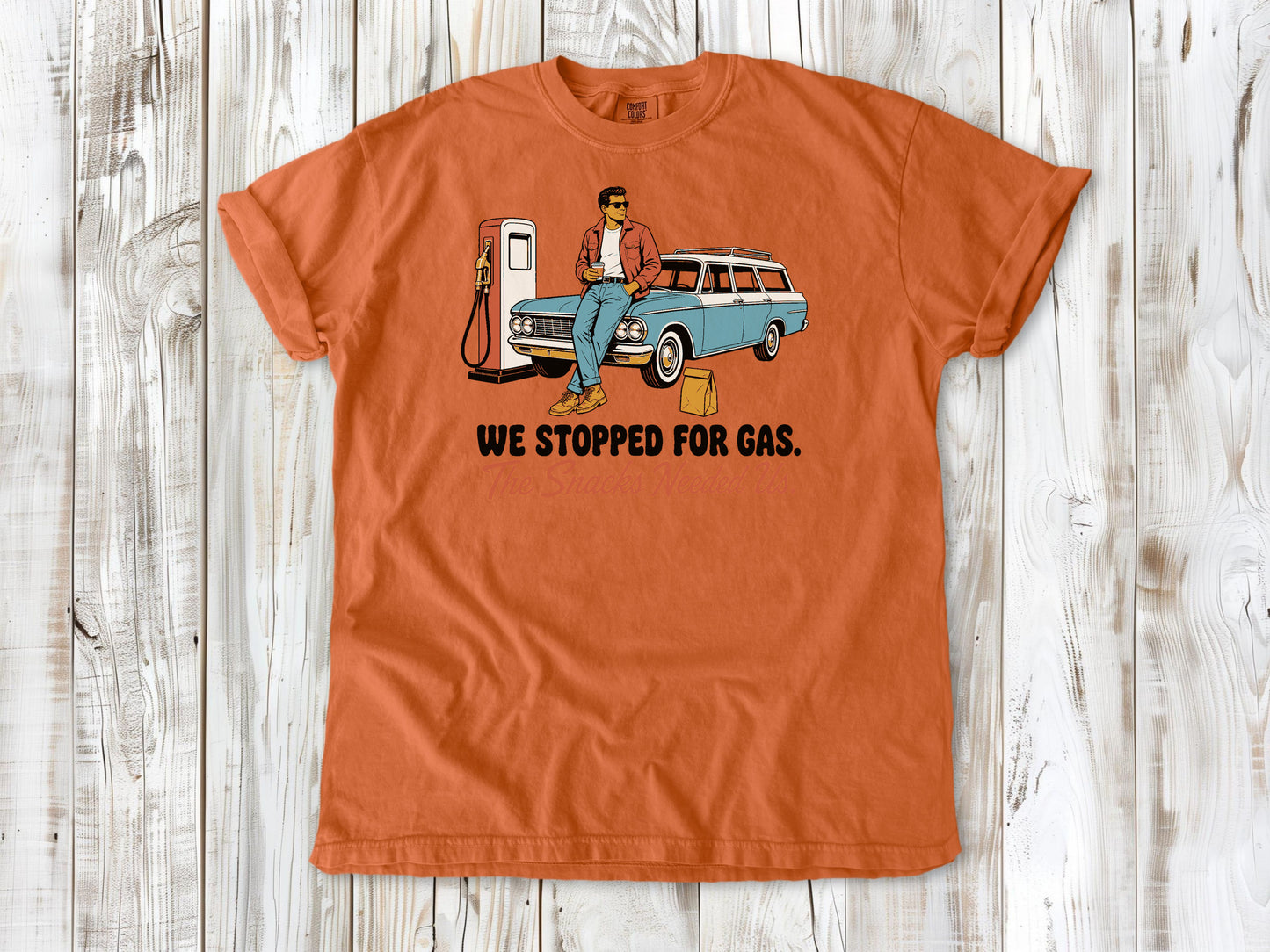 Seafoam garment-dyed tee with We Stopped for Gas The Snacks Needed Us road trip graphic.