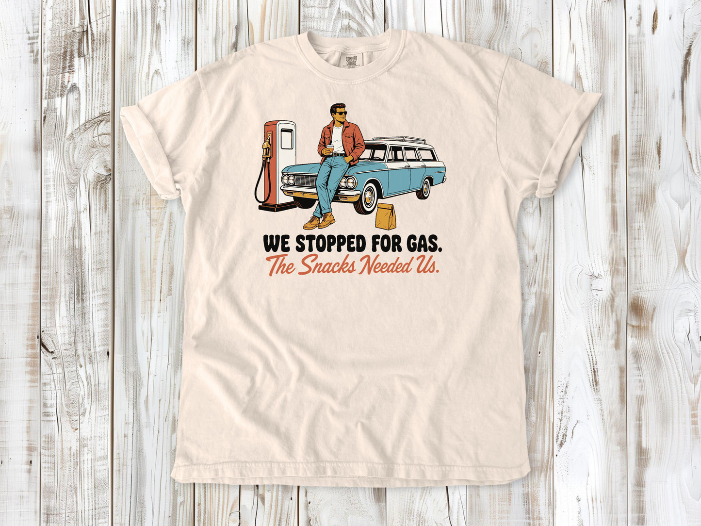 Butter garment-dyed tee with We Stopped for Gas The Snacks Needed Us road trip graphic.