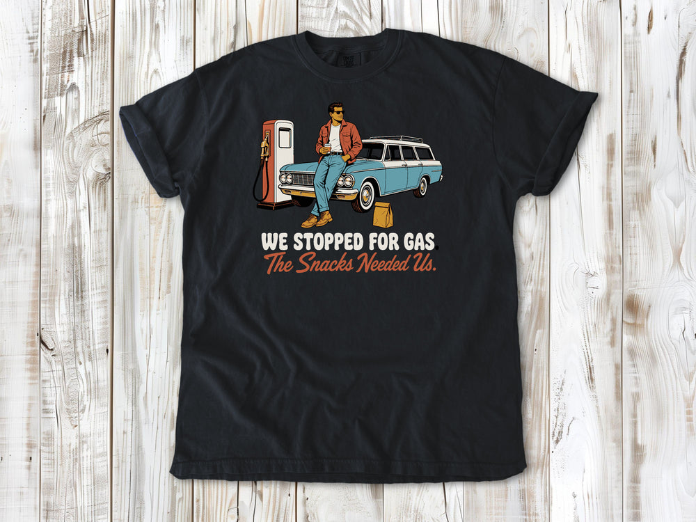 Washed Denim garment-dyed tee with We Stopped for Gas The Snacks Needed Us road trip graphic.