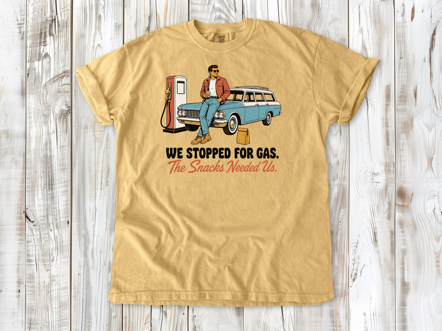Burnt Orange garment-dyed tee with We Stopped for Gas The Snacks Needed Us road trip graphic.