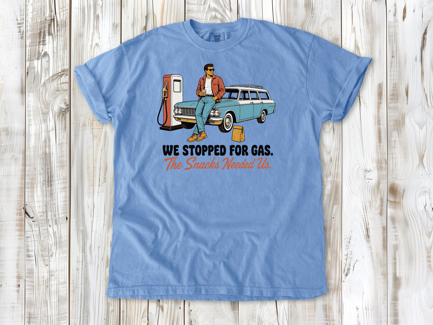 Pepper garment-dyed tee with We Stopped for Gas The Snacks Needed Us road trip graphic.
