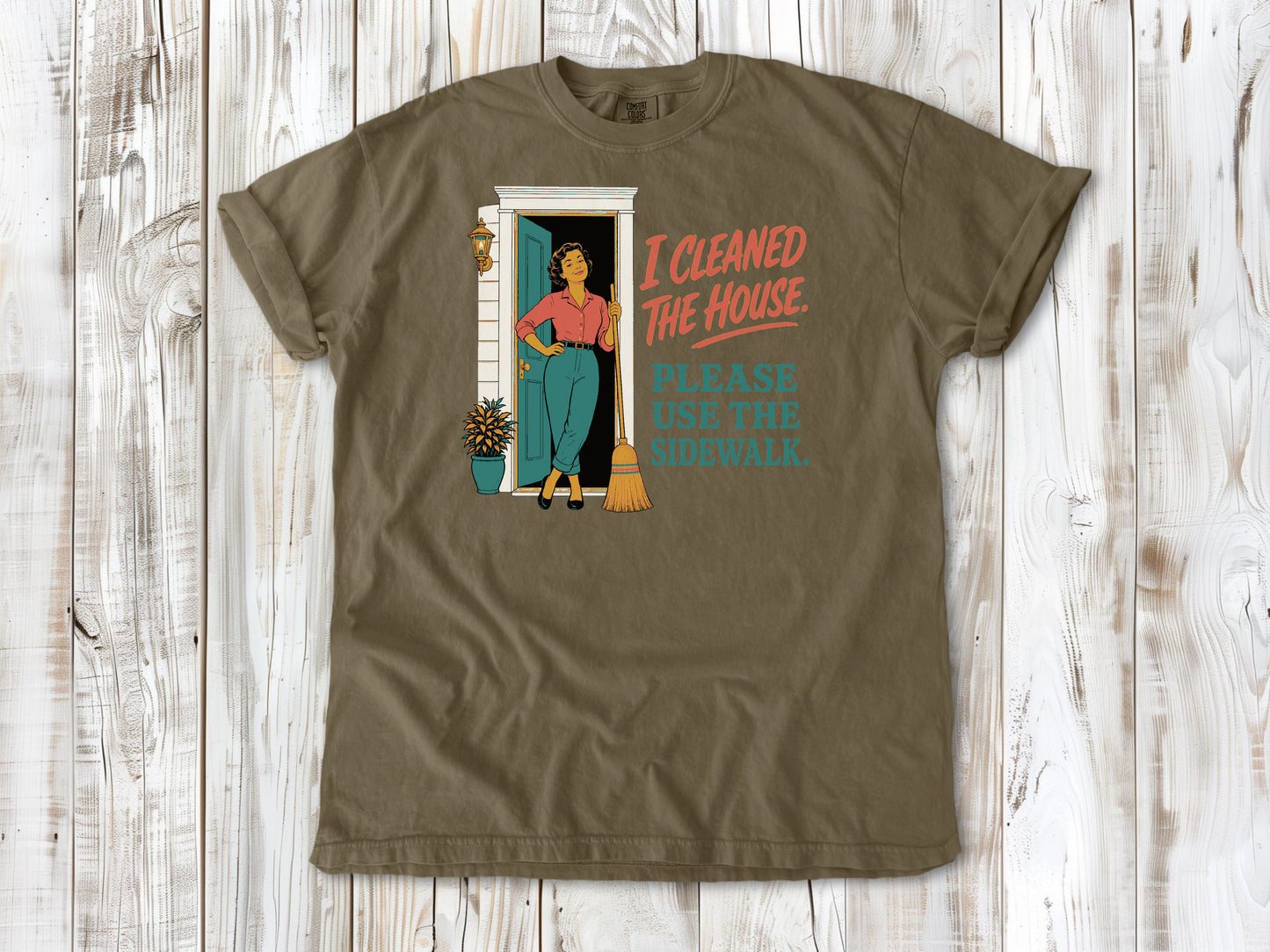 Graphite garment-dyed tee with I Cleaned the House Please Use the Sidewalk cleaning graphic.